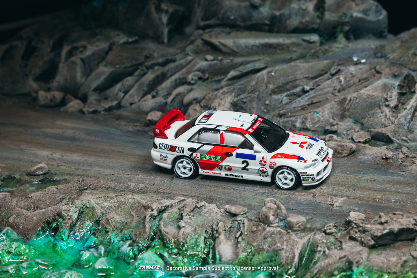Tarmac • 1:64 • MITSUBISHI LANCER EVO III Hong Kong Raylli 1996