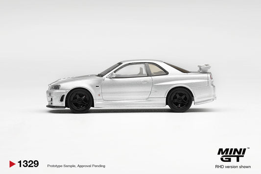 Mini GT • 1:64 • NISSAN SKYLINE GT-R (R34) ZTUNE SILVER METALLIC 1999