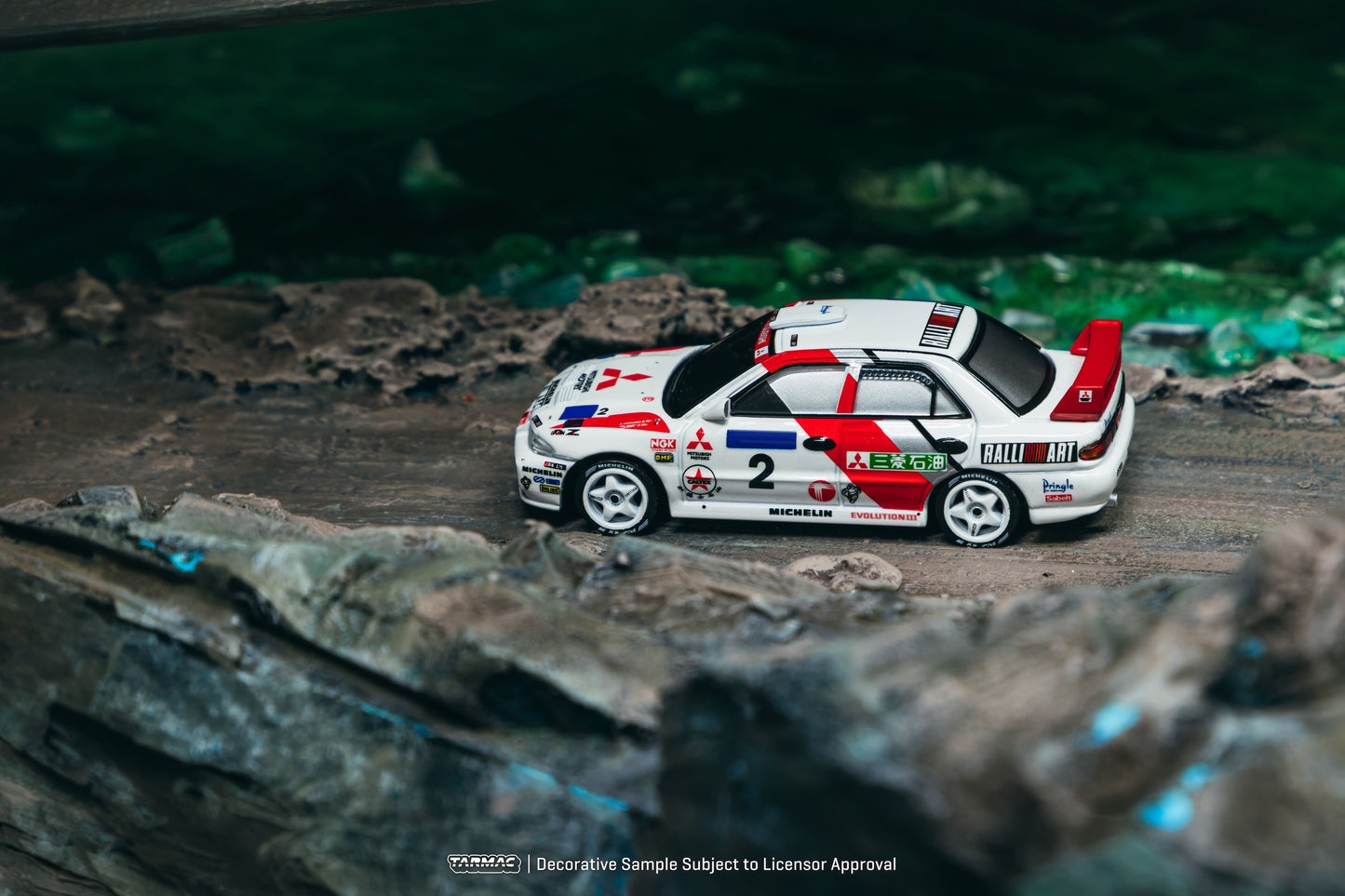 Tarmac • 1:64 • MITSUBISHI LANCER EVO III Hong Kong Raylli 1996